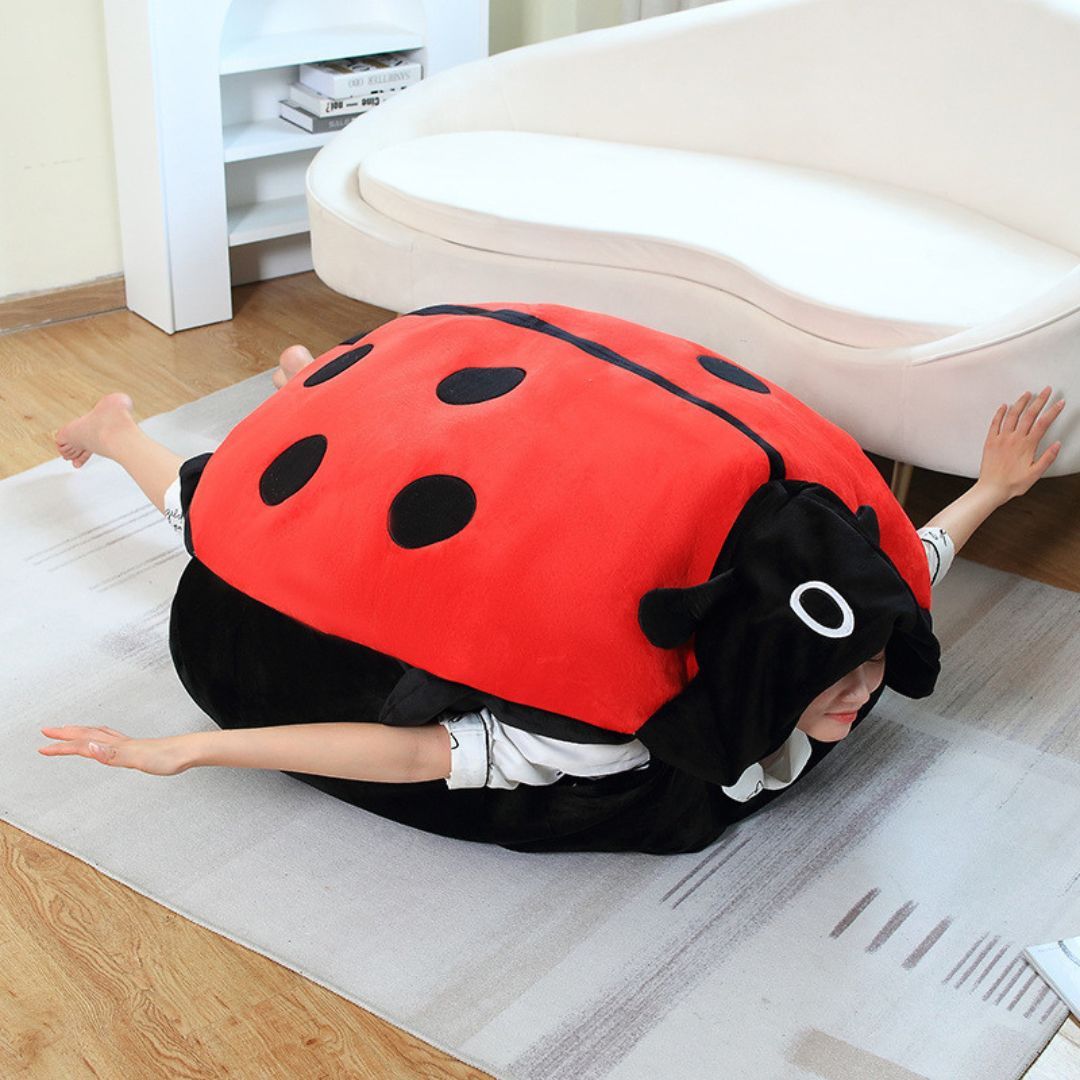SnugBug™ – Wearable Ladybug Pillow
